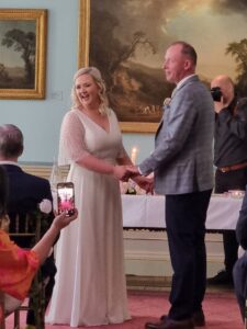 Bride and groom exchanging vows during their wedding ceremony at Fota House.