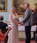 Bride and groom exchanging vows during their wedding ceremony at Fota House.